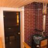 Липовая парная с дровяной печью Harvia и абажурами из гималайской соли